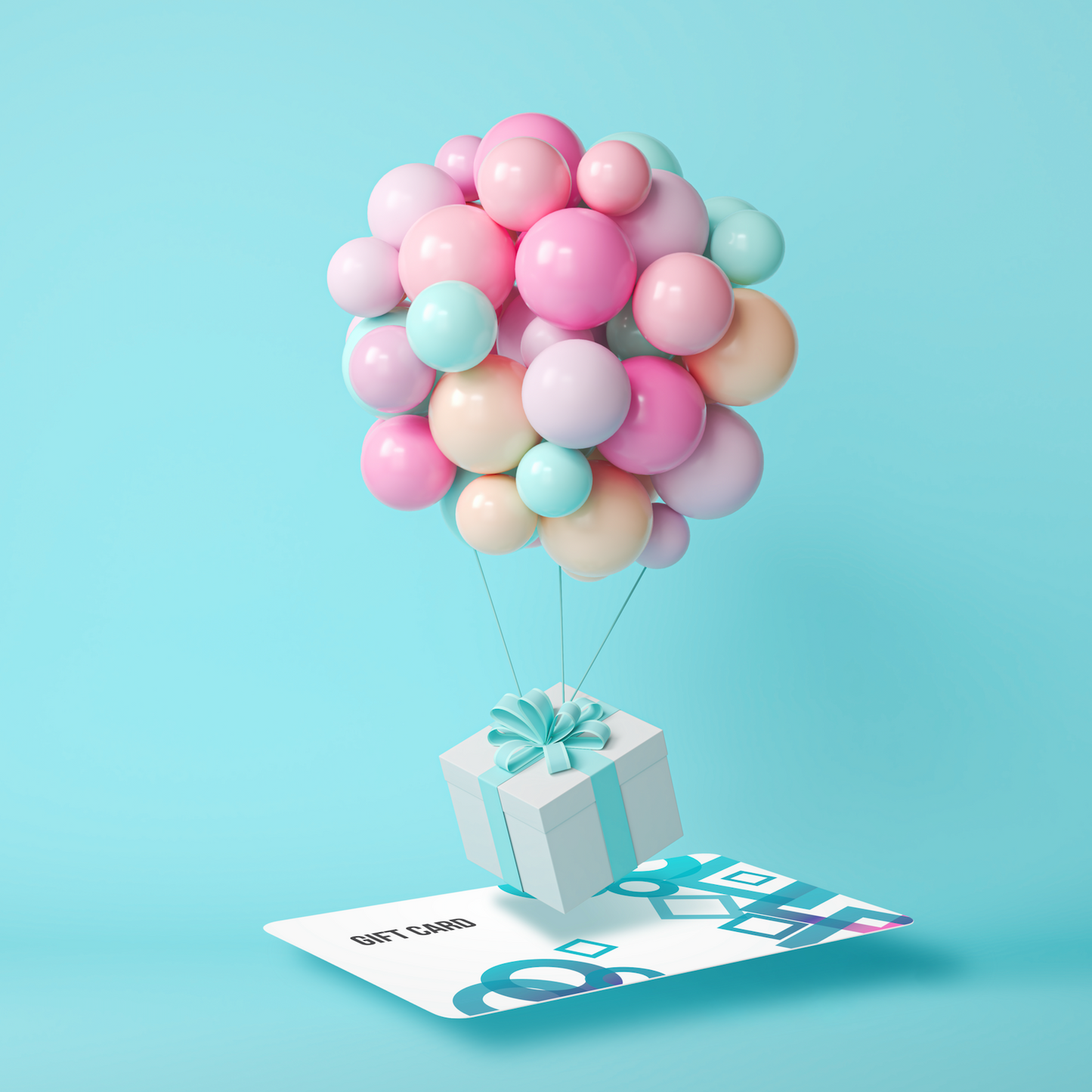 Light turquoise background. A blue and white gift card is hovering face up just above the ground. A large bunch of pink, blue and orange balloons are attached to a white present with a blue ribbon that hovers just above the gift card. The present looks like it is taking off like a hot air balloon.