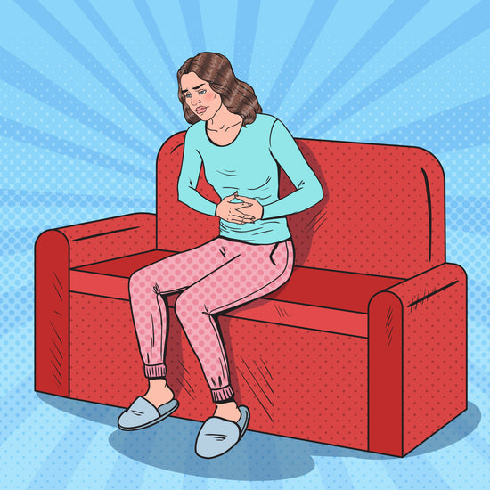 Pop art image of a women sitting on a red sofa clutching her stomach.  She has a look of pain on her face.  She is wearing pink trousers and a blue top.